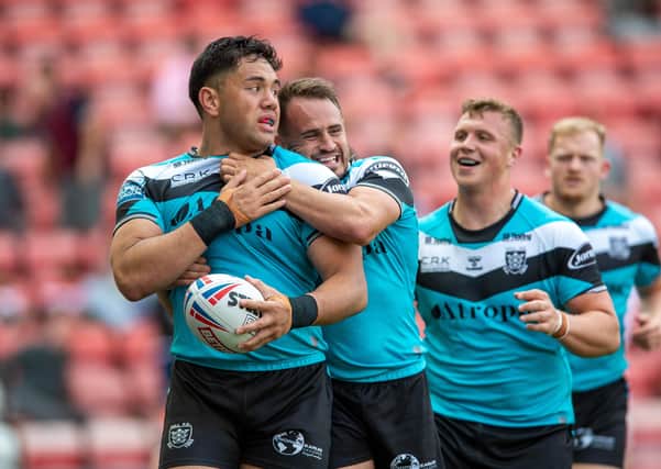 Hat-trick star: Andre Savelio celebrates  the second of his three tries for Hull at 
Leigh Centurions.  Pictures: Bruce Rollinson