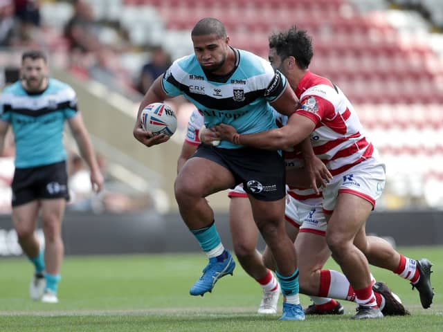 Out of my way: Hull FC's Tevita Satae is challenged during the Super League match at Leigh Sports Village. Picture: PA