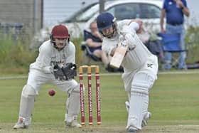 Driving force: Lee Goddard of New Farnley who top scored with 48 in their Bradford League defeat to Woodlands. Picture: Steve Riding