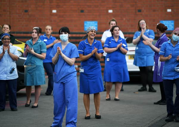 A Clap for Carers celebration outside Leeds General Infirmary during the Covid lockdown.