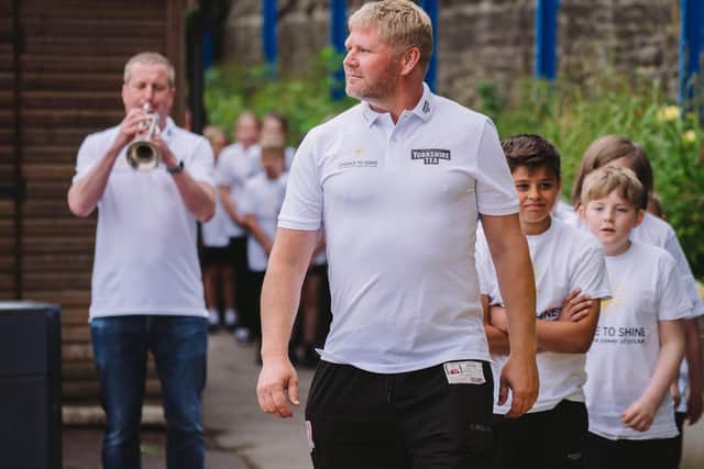 Matthew Hoggard joins students and teachers from Stanningley Primary School in Pudsey (Picture: Barnaby Aldrick)