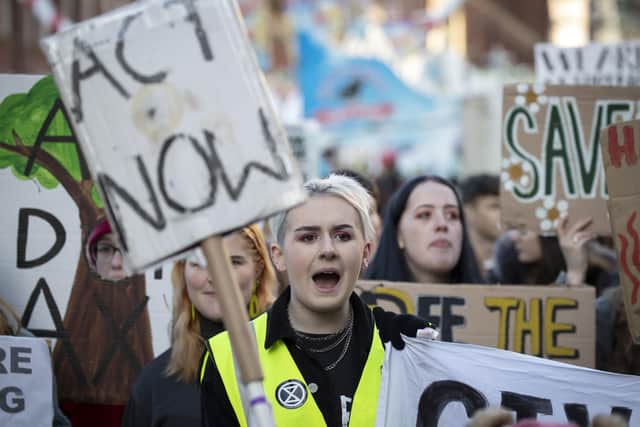 Protesters in Leeds, as tens of thousands of children across the UK skipped school as part of a global climate strike.