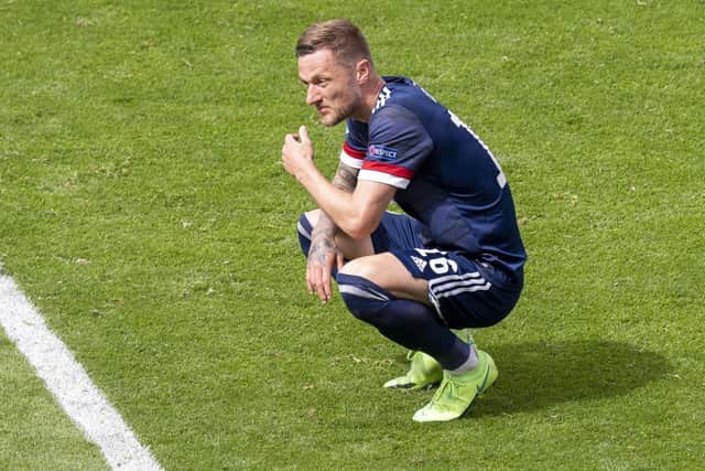 Scotland's Liam Cooper is left dejected during a Euro 2020 match between Scotland and Czech Republic at Hampden Park on June 14, 2021, in Glasgow, Scotland. (Picture: Ross Parker/SNS Group via Getty Images)
