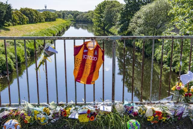 Pictured, tributes to young Bradford City footballer, Tomi Solomon, aged 13, who tragically died after playing in the River Calder at Brighouse. Photo credit: Tony Johnson/JPIMedia