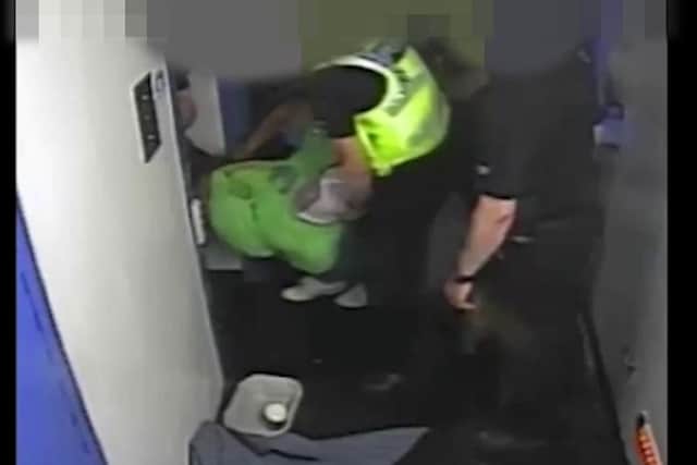 Screen-grab taken from CCTV footage issued by West Yorkshire Police dated 13/09/16 which was played to the jury at the inquest into the September 2016 death of Andrew Hall whilst in police custody. The footage shows Andrew Hall being carried by police officers into a cell at Huddersfield Police Station, West Yorkshire. An inquest jury has found the use of force by officers involved in the violent struggle was "justified, necessary and proportionate".