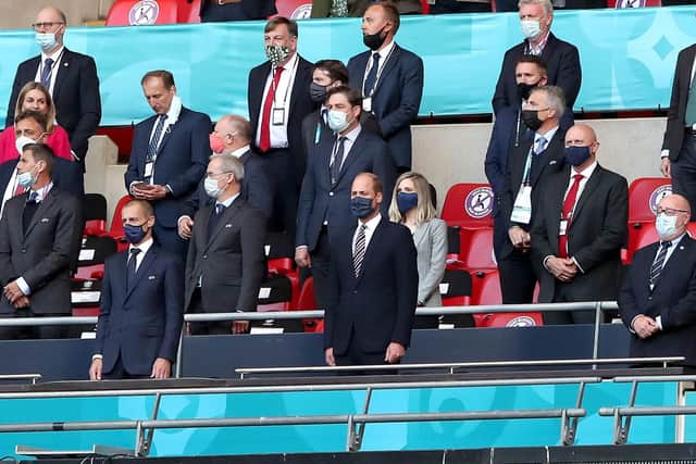 The Duke of Cambridge (centre) and UEFA President Aleksander Ceferin (left) in the stands before the UEFA Euro 2020 Group D match at Wembley Stadium, London.