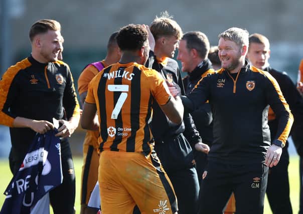 Hull City manager Grant McCann (right) celebrates promotion to the Championship. Picture: Tim Goode/PA