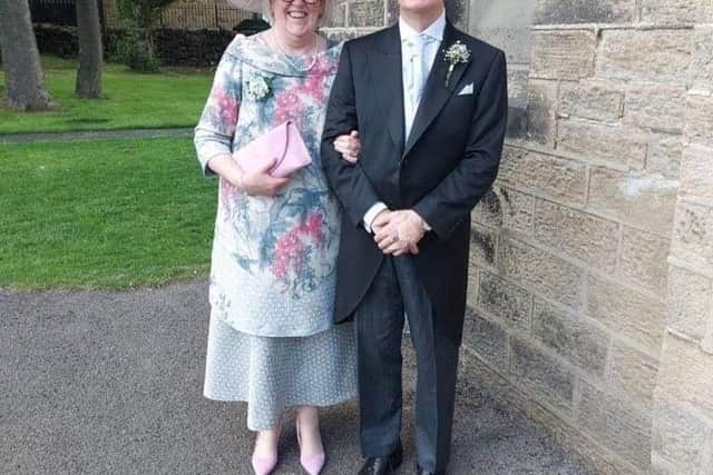 Christine and Andrew Clapperton at St Mary's Church in Horsforth recently. Mother of the groom Christine wears a bespoke outfit designed by Jillian Welch Design in Harrogate.