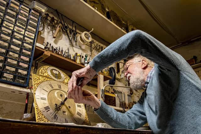 David Barker, busy in his workshop with a moon face clock dated 1750 by John Greaves in Newcastle who was a Yorkshireman. Picture Tony Johnson