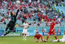 Wales goalkeeper Danny Ward makes a save as Switzerland's Manuel Akanji, Mario Gavranovic and Wales' Chris Mepham and Ben Davies look on. Picture: PA