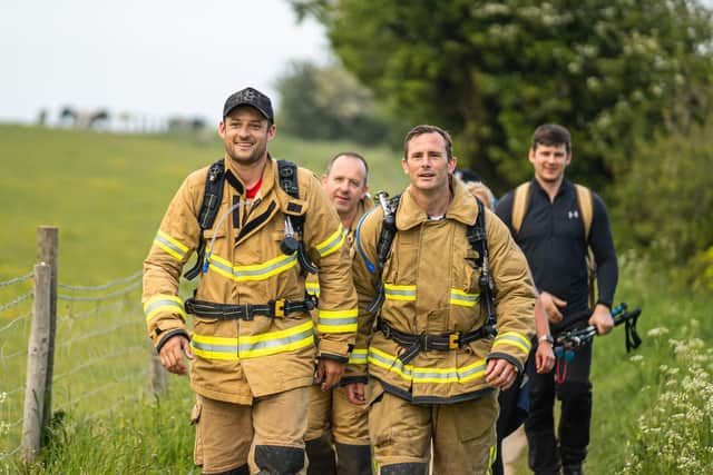 Joey (left) and four friends walked 190 miles for charity