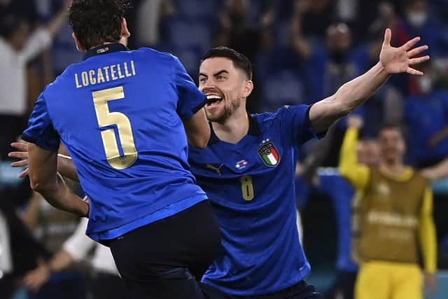 Italy's Manuel Locatelli, left, celebrates scoring his second goal against the Swiss. Picture: Andreas Solaro/Pool Photo via AP