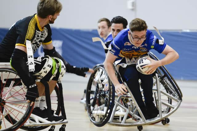Josh Butler, right, playing for 
Leeds Rhinos wheelchair rugby league team when they lifted the Challenge Cup after defeating The Argonauts in 2019 (Picture: Dean Atkins/SWpix.com)