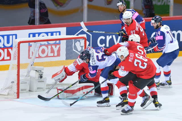 GET IN: Brendan Connolly (No 63) scores a third poeriod goal in GB's final Group A World Championship clash against Switzerland. Picture: Dean Woolley.