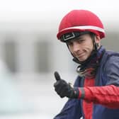 Ben Robinson gestures after winning the William Hill Northumberland Plate Handicap  race on Nicholas T.