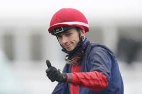 Ben Robinson gestures after winning the William Hill Northumberland Plate Handicap  race on Nicholas T.