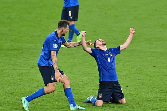Francesco Acerbi and Jorginho of Italy celebrate their side's victory. (Photo by Justin Tallis - Pool/Getty Images)