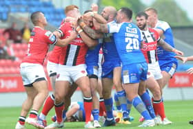 Bust up: Bodene Thompson of Leeds Rhinos, right, is sent off along with Salford Red Devils' Lee Mossop. Picture: Steve Riding