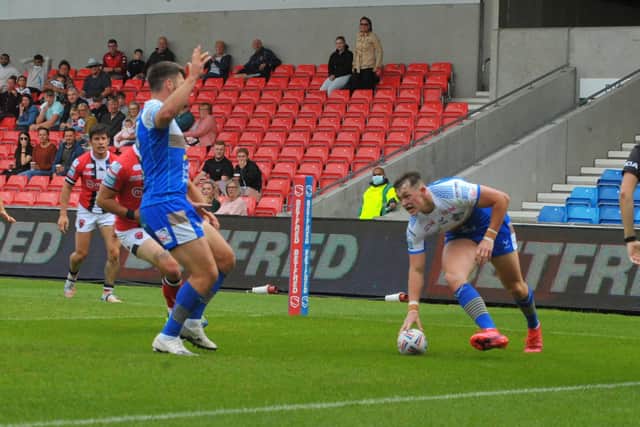 Alright Jack: Leeds Rhinos winger 
Jack Broadbent scores a try. Picture: Steve Riding
