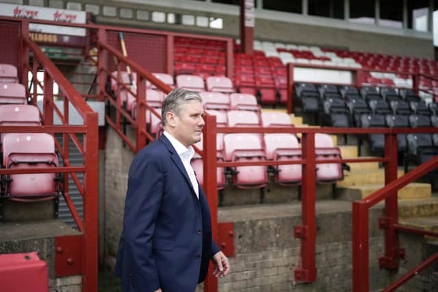 Labour leader Sir Keir Starmer is coming under intense pressure ahead of this week's Batley and Spen by-election. He is pictured during a recent visit to Batley to support his party's candidate Kim Leadbeater.