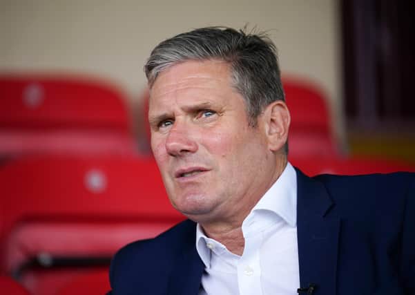 Labour leader Sir Keir Starmer is coming under intense pressure ahead of this week's Batley and Spen by-election. He is pictured during a recent visit to Batley to support his party's candidate Kim Leadbeater.