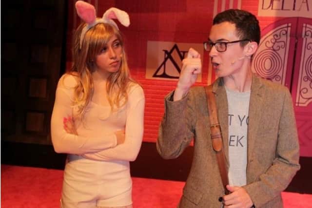Pictured Carys Peedell (left) performing as the lead during the Upstage Academy production of 'Legally Blonde'. The talented actress said acting has helped her conquer her shyness. Photo credit: Submitted picture