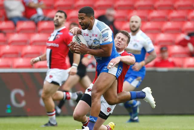 Kruise Leeming scores for Leeds Rhinos in their win over Salford Red Devils. (ED SYKES/SWPIX)