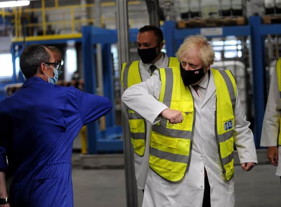 Prime Minister Boris Johnson pictured during his visit to PPG Architectural Coatings, Huddersfield Road, Birstall, West Yorkshire. Picture by Simon Hulme
