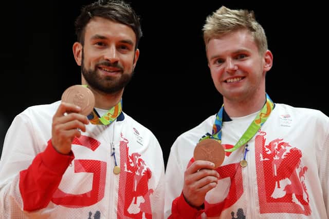 Huddersfield and Great Britain's Marcus Ellis and Chris Langridge (left) with their bronze medals following the men's badminton doubles final at Rio (Picture: David Davies/PA Wire)