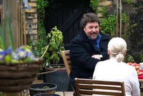 Michael sat in the garden reminiscing with his Auntie Denise over some tea and cakes. Picture: PA Photo/Wildflame Productions.