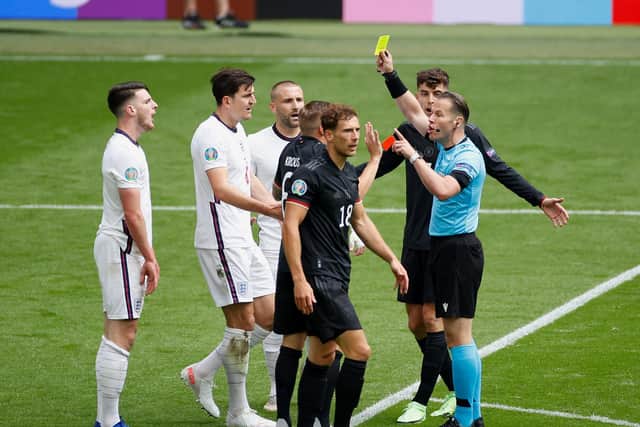 TIGHTROPE: Declan Rice is booked against Germany after bringing down Goretzka in the first half. Picture: Getty Images.