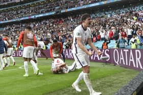 England's Harry Maguire celebrates after Harry Kane scored his side's 2nd goal. (Andy Rain, Pool via AP)