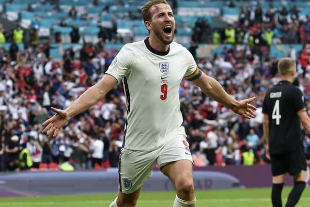 Harry Kane celebrates after scoring his side's second goal against Germany. (Andy Rain, Pool via AP)
