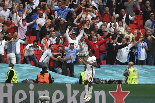 England's Raheem Sterling celebrates. (Justin Tallis, Pool Photo via AP)