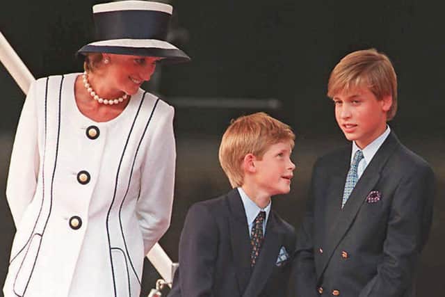 Princess Diana (L), Prince Harry, (C) and Prince William (R) gather for the commemorations of VJ Day, 19 August 1995, in London.