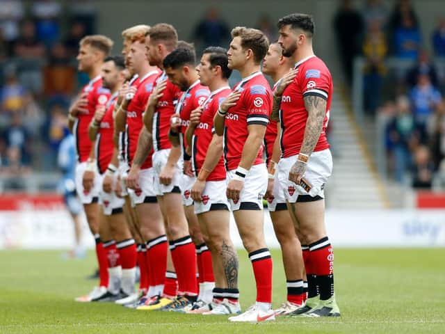 Salford Red Devils players line-up ahead of Sunday's game against Leeds Rhinos. (ED SYKES/SWPIX)
