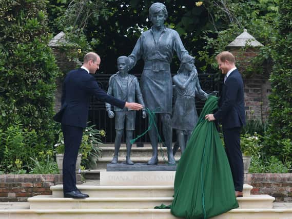 The two Dukes stood shoulder to shoulder to mark the memory of their beloved mother, Diana, Princess of Wales, as a long-awaited statue was finally unveiled in the gardens of her treasured London home, Kensington Palace.
Picture: PA