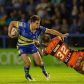 Swapping sides:  Warrington's Jake Mamo, right, in action against his new club Castleford. Picture Bruce Rollinson