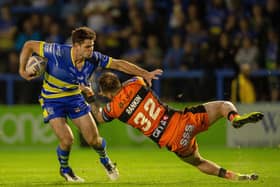 Swapping sides:  Warrington's Jake Mamo, right,
 in action against his new club Castleford. Picture Bruce Rollinson