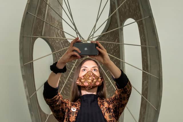Assistant Curator Clare Nadal photographs the Barbara Hepworth: Art and Life exhibition at the Hepworth Wakefield art museum in Wakefield, West Yorkshire to mark their 10th anniversary. Picture: Danny Lawson/PA