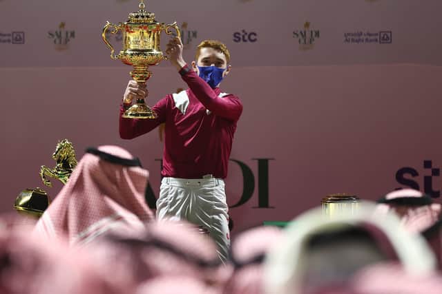 David Egan celebrates his Saudi Cup win on Mishriff.