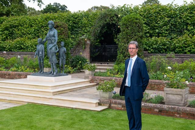 Sculptor Ian Rank-Broadley with his statue of Diana, Princess of Wales, in the Sunken Garden at Kensington Palace, London. Picture: Dominic Lipinski/PA Wire