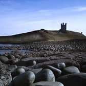 Dunstanburgh Castle by the North Sea in Northumberland, taken from Embleton Bay. Picture by Jane Coltman