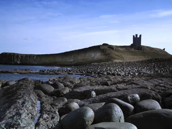 Dunstanburgh Castle by the North Sea in Northumberland, taken from Embleton Bay. Picture by Jane Coltman