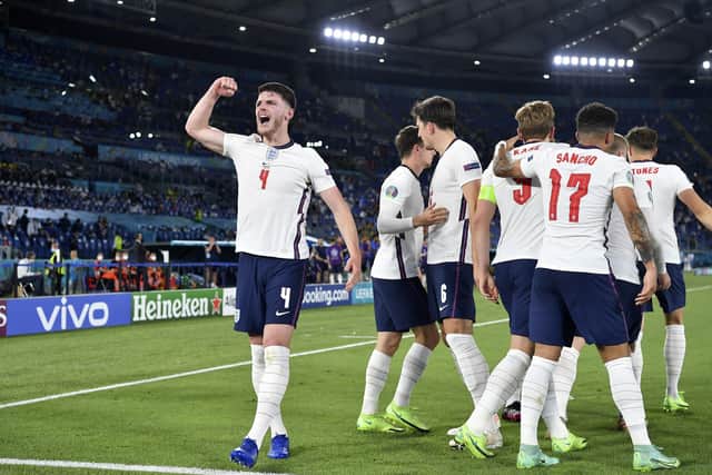 England's Declan Rice celebrates his side's third goal during the Euro 2020 quarter-final match between Ukraine and England at the Olympic stadium in Rome. (AP Photo/Ettore Ferrari, Pool)