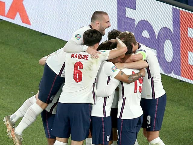 England's Jordan Henderson is mobbed by team-mates after scoring their side's fourth goal of the game (Picture: PA)