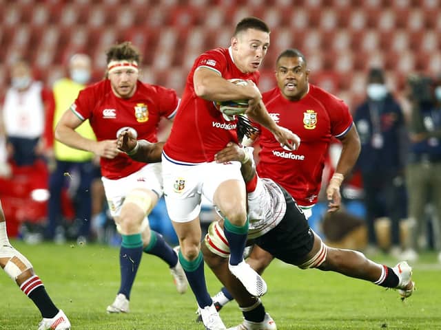 Unstoppable: Josh Adams evades a challenge on his way to a fourth try for the British Lions. (Picture: Steve Haag/PA)