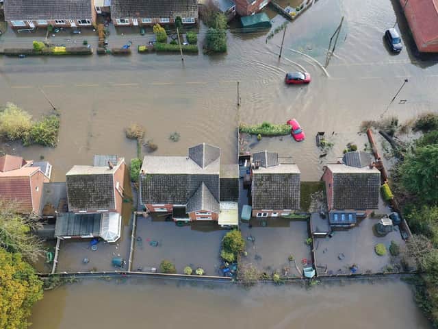 The flood water at Fishlake, in Doncaster, South Yorkshire, as parts of England endured a month's worth of rain in 24 hours in December 2019, with scores of people rescued or forced to evacuate their homes. Picture: Richard McCarthy/PA Wire