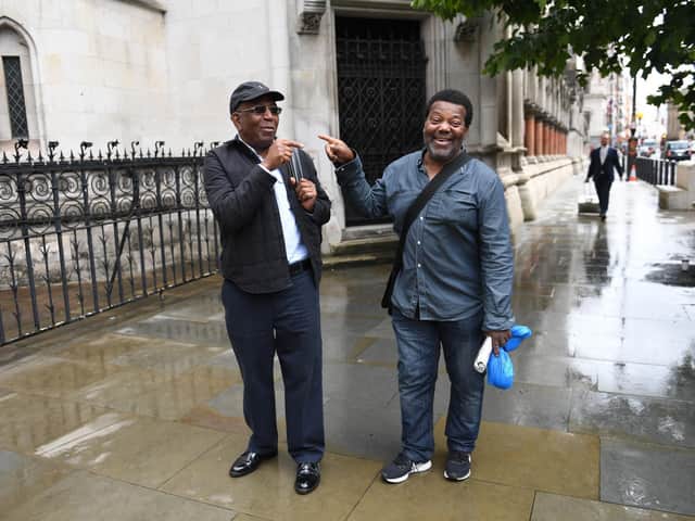 Paul Green (left) and Cleveland Davidson outside the Royal Courts of Justice in London.