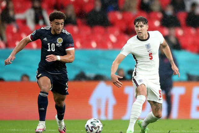 CENTRE STAGE: England's John Stones battles with Scotland's Che Adams during the Euro 2020 Group D match at Wembley. Picture: Nick Potts/PA
